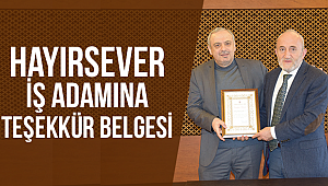 Hayırsever iş adamına teşekkür belgesi