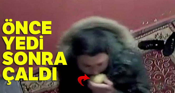 Elma yiyerek ayakkabı çalan hırsız kamerada