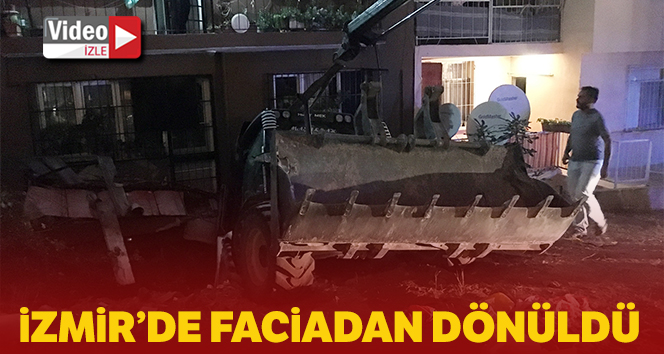 Park halindeki kepçe 5 katlı binaya daldı