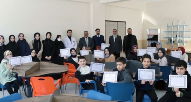 Müftülük karne dağıtım törenine katıldı