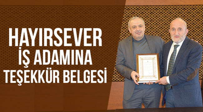 Hayırsever iş adamına teşekkür belgesi